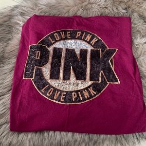 Maroon sequen Victoria’s Secret t-shirt.